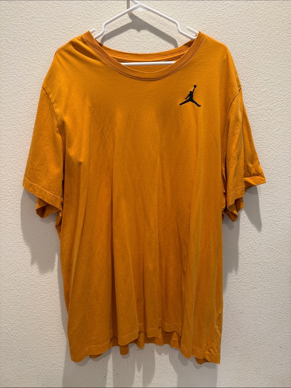 Jordan Men's Orange Crewneck Short Sleeve Tee with Black Jumpman